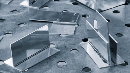 welding seam onto steel metal Industrial steel welder in factory.