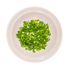 Sliced green onion rings.Finely chopped circles of bright green onion feathers.Green onion background.