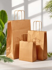Three brown paper shopping bags of various sizes are arranged together.
