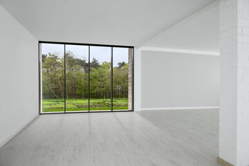 Empty apartment with floor-to-ceiling window. Interior design
