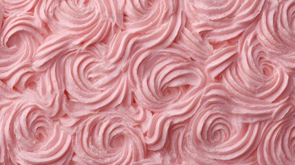Intricate rose-like swirls of delicate pink frosting create a beautiful, textured background