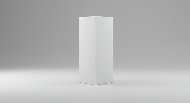 Plain white rectangular prism stands upright on a light surface against a gradient background