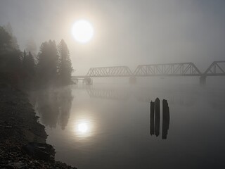  Sun backlights early morning landscape.