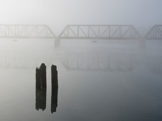  Foggy morning landscape on the river.