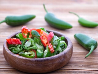  Bowl of sliced up peppers.