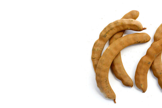 Fresh tamarind on a white background.