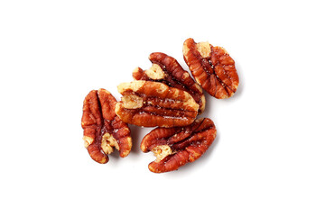 Delicious salted pecan nuts scattered.