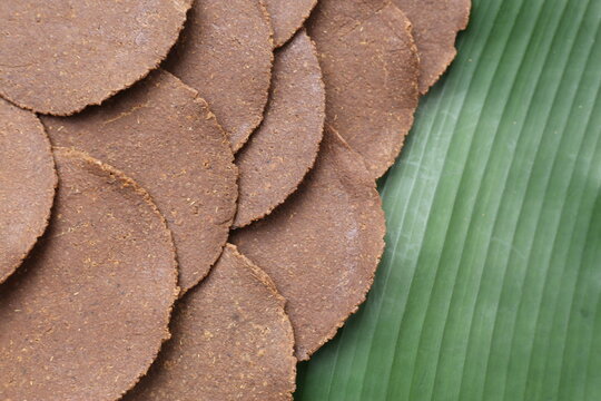 Fermented soybean discs, known as &ldquo;Thua Nao,&rdquo; a traditional Thai seasoning used to enhance flavor in Northern cuisine.