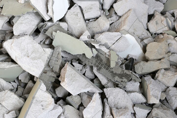 Broken concrete, Piles of lightweight construction bricks after house demolition