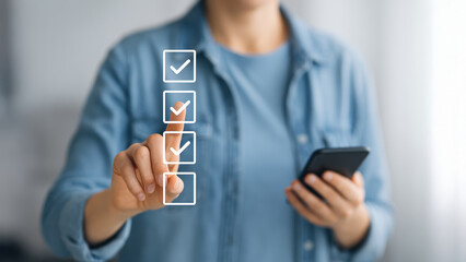 Quality control checklist concept iso standards compliance gesture with smartphone and touchscreen interface conveying organization and efficiency