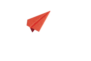 A vibrant red paper airplane angled to the upper left, suspended against a stark black background