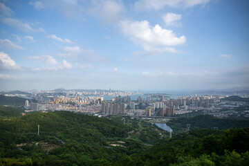 A Harmonious Blend of Urban Panorama and Natural Landscape from a Elevated Viewpoint