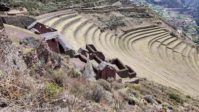 Pisac, Peru: Panoramic footage of the famous Pisac Inca archeological site in Peru. Showing famous agriculture terraces in sacred valley region near Cusco