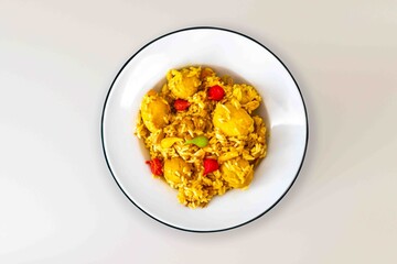 Traditional Brazilian dish of rice, chicken, and pequi (Brazilian caryocar), known as Goiana chicken stew.