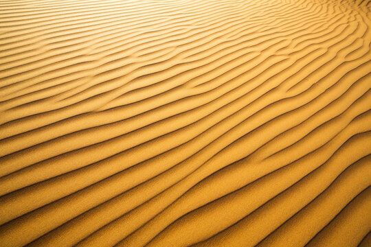 Rippled sand background, full frame abstract