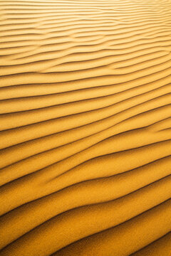 Rippled sand background, full frame nature abstract