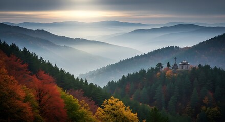 Obraz premium Autumn Mountain Chapel with Misty Sunrise.