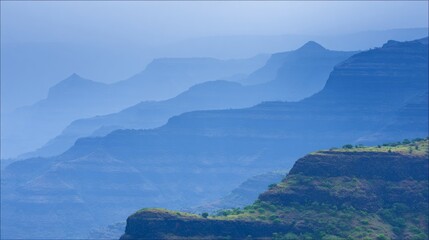 concentric. Mountain valley with concentric air ripples, misty natural landscape. travel magazines, destination branding, designed for travel destination branding, inspires travel planning.
