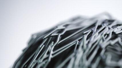 Close-up of a futuristic metal lattice made of interwoven glossy rods