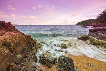 Beautiful sunset on the tropical sea at Pink Stone Yard, Channthaburi Province, Thailand.