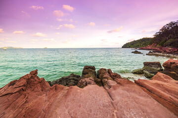 Beautiful sunset on the tropical sea at Pink Stone Yard, Channthaburi Province, Thailand.