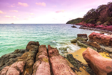 Beautiful sunset on the tropical sea at Pink Stone Yard, Channthaburi Province, Thailand.