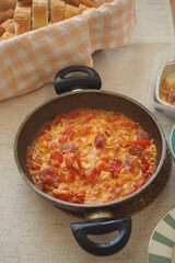 Delicious turkish menemen served at breakfast table