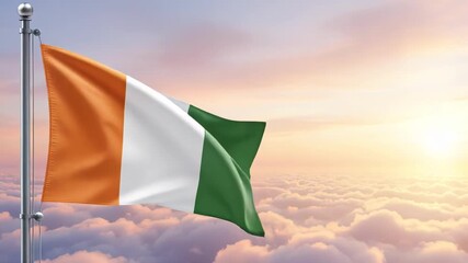National flag of ivory coast nation waving on the wind with a beautiful sunset on the background, banner of the country