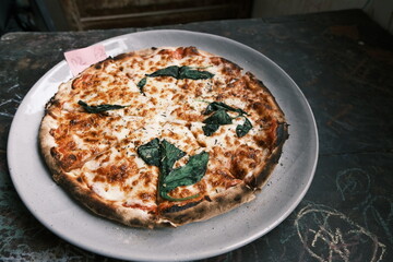 Close-up of traditional Italian meat sauce and cheese pizza
