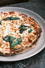 Close-up of traditional Italian meat sauce and cheese pizza