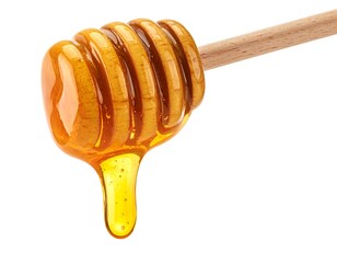 Close-up of golden syrup dripping from a wooden honey dipper