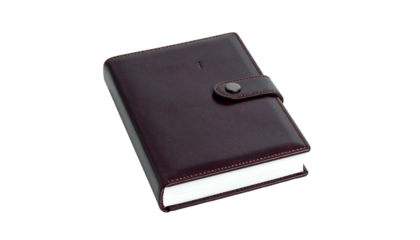 A closed, dark brown leather notebook with a button closure and white paper edges, isolated