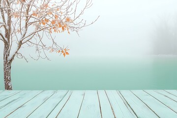 Foggy Morning Scene with Bare Tree and Calm Water in Serene Pastel Tones