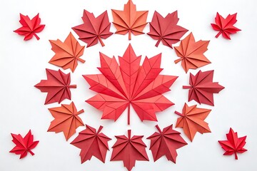 A circle of red and orange origami maple leaves arranged artistically isolated on white background