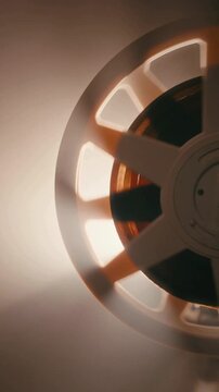Vintage film projector showing old movie reel for entertainment history lesson