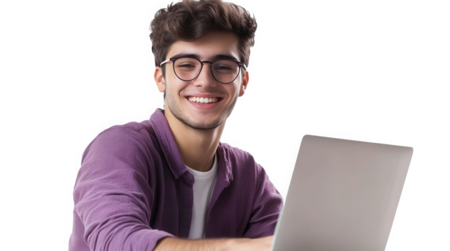 Smiling young man with glasses using laptop computer in a bright studio on transparent background