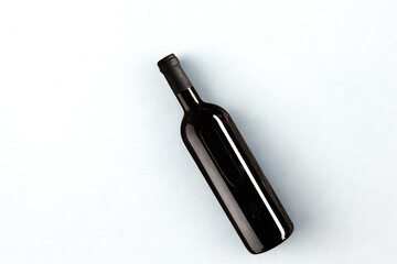 Elegant dark glass wine bottle isolated on white background