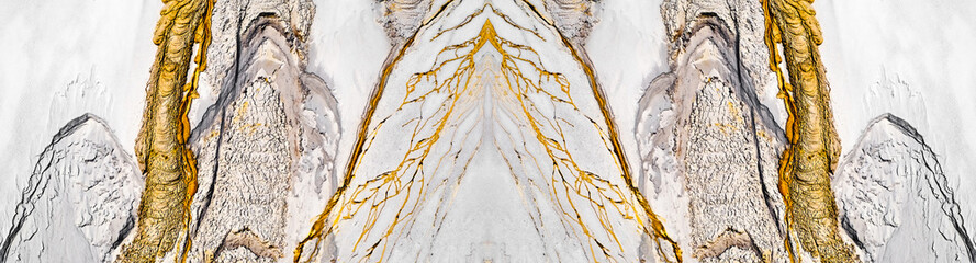 The golden river water streak on sand at abandoned kaolin quarry © Roberto Sorin