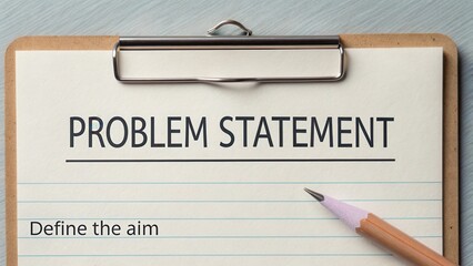 Clear problem statement on clipboard emphasizing the definition of the aim in a professional, organized manner for project development