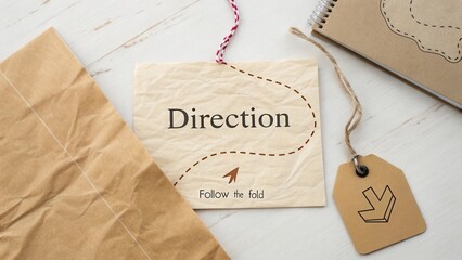 Direction Signage with Follow the Fold Arrow on Textured Background for Travel and Navigation Purposes