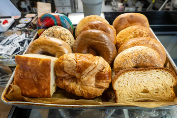 Chesapeake Beach, Maryland USA Fresh breads like donuts, cakes and bagels at a cafe.