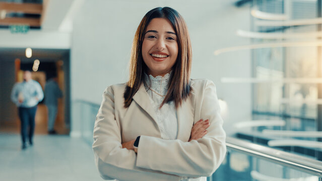 Portrait, woman or paralegal in office with arms crossed for legal aid, labour law rights and advice. Confident, person and lawyer in workplace with pride for advocacy, employment equity or about us.
