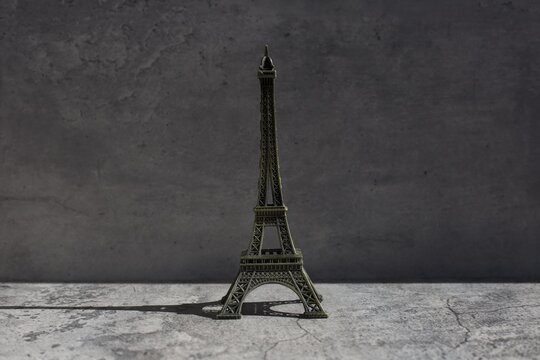 Eiffel Tower decoration on grey background