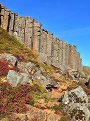 Gerðuberg Basalt Columns, Snæfellsnes Peninsula, Iceland, Geological Formation under Clear Blue Sky