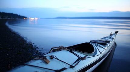 kayak. A kayak rests on the shoreline, reflecting calm blue waters in a serene natural setting. tourism brochures, itinerary planners, designed for travel destination branding.
