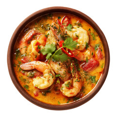 Fototapeta premium Brazil Moqueca fish stew soup garnished with coconut milk, herbs and chili peppers, served in wooden bowl isolated on white transparent background, concept of South American seafood cuisine