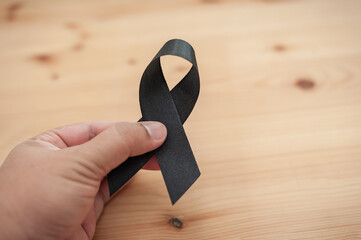 Funeral and mourning with black ribbon emotional tribute personal reflection intimate setting