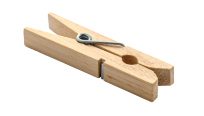 Wooden clothespin with metal spring mechanism, angled view
