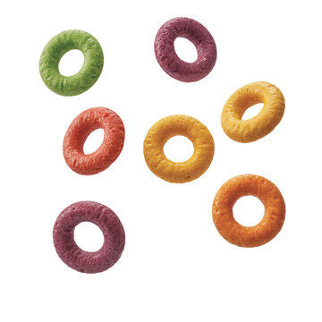 Colorful Cereal Rings on Transparent Background Green, Purple, Orange, and Yellow Cereal Pieces