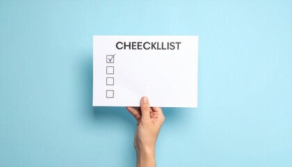 Hand holding checklist card with one blue checkmark on light blue background.